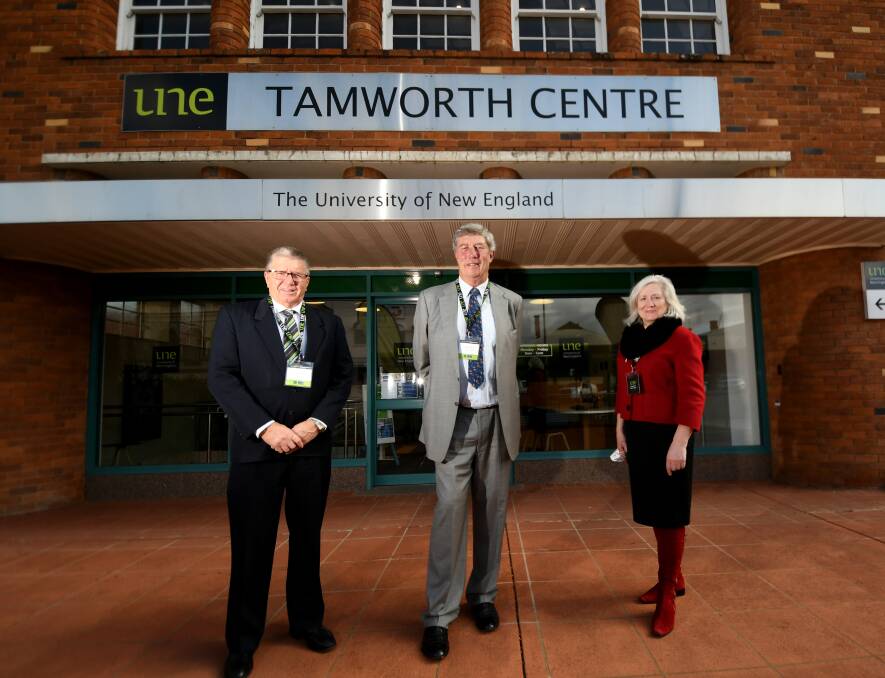 MAPPED OUT: Tamworth mayor Col Murray, University of New England Chancellor Professor James Harris and Vice-Chancellor Professor Brigid Heywood at the launch for Tamworth University plans. Photo: Gareth Gardner