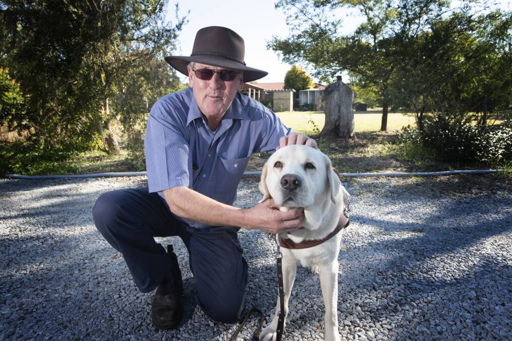 BEST BUDS: Phillip Tilley and his guide dog Nelson. Photo: Peter Hardin