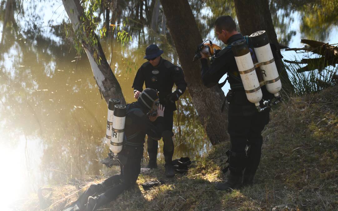 Major search: Police divers at Eaglehawk Reserve near Bingara on Tuesday morning. Photos: Aidan Wondracz