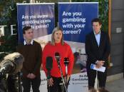 CRACKING DOWN: Local counsellor Jake Plowes, Director of the Office of Responsible Gambling Natalie Wright, and Minister for Hospitality and Racing Kevin Anderson. Photo: Gareth Gardner