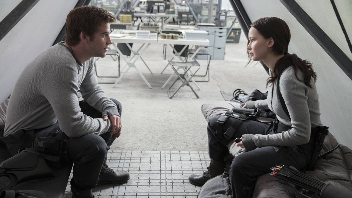 Hunger Games: Mockingjay Part 2 with Liam Hemsworth and Jennifer Lawrence is among the memorable dystopian stories.