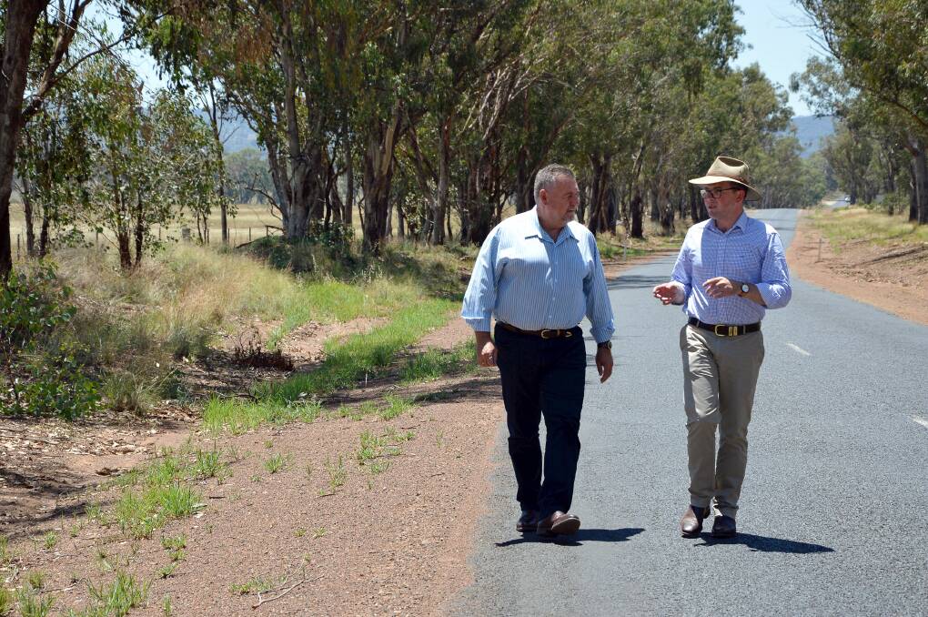 Uralla Shire Council mayor Mick Pearce and Member for Northern Tablelands Adam Marshall inspect the Thunderbolts Way north of Bundarra, which will soon be upgraded.