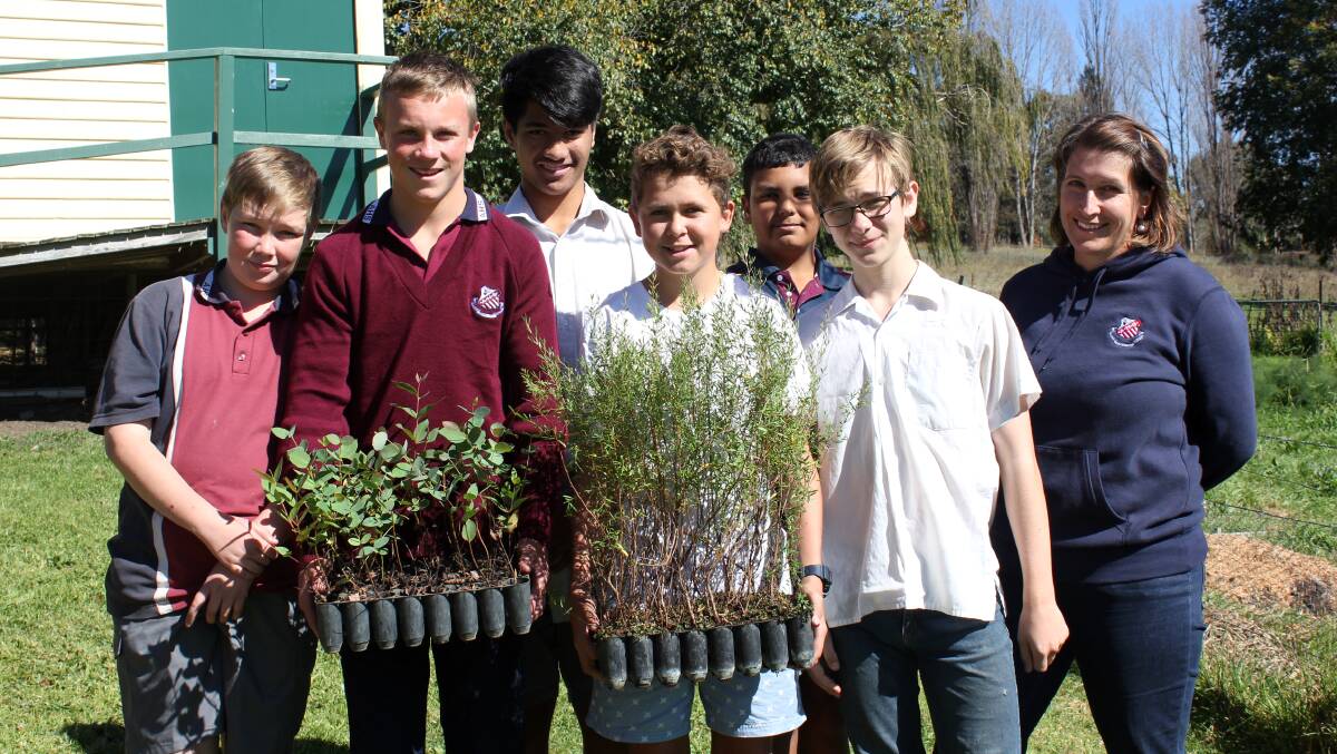 SUSTAINABLE STUDENTS: Armidale High School students that will replace the BC2 group with agriculture teacher Bec Smith. 