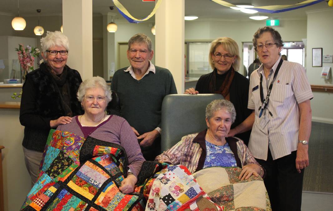 RESIDENTS RUGGED UP: From left back, Helen Lock, Gordon Greaves, Robyn Wood, Coral Thrift, front, Beryl McMillan and Fay Frost at Ken Thompson's Lodge.