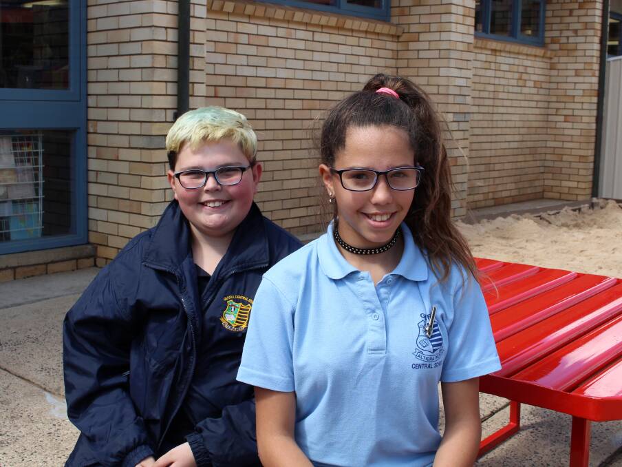NEW SPECTACLES FOR KIDS: Guyra Central School students Ethan Harris and Nioka Levy wearing their new glasses, courtesy of the Brien Holden Vision Institute eye clinic. An optometrist visited the school in late August.