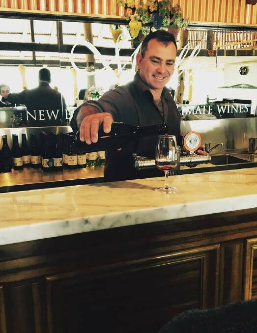 WINERY: Merilba Estates director and wine-maker Shaun Cassidy pours a delicious drop for customers at their New England winery. The winery has been recognised for its unconventional distribution methods.