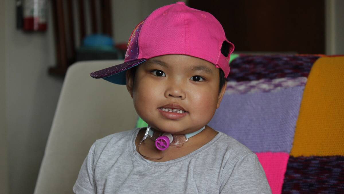 BRAVE FACE: Seven-year-old Ella Sacaray has had an operation to have a tumour on her brain removed.