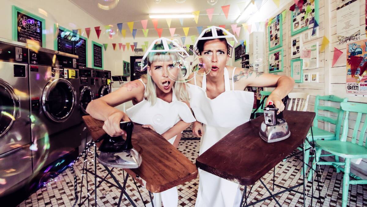 WASHED UP: The Ironing Maidens Melania Jack and Patty Preece will perform at North Hill Laundromat.