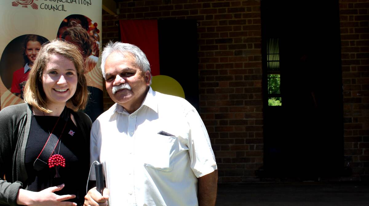 RECONCILIATION THROUGH ART: NSW Reconciliation Council project officer Georgia Behrens with Anaiwan elder Steve Widders at the exhibition opening.