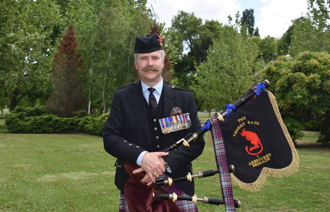 Charles 'Mac' MacLachlan is a member of the Glen Innes Pipe Band.