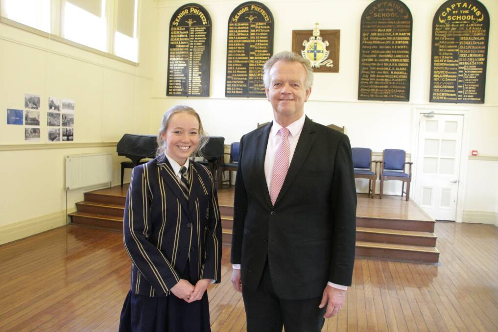 TAS Headmaster Murray Guest with Ellie De Gunst, who has been
inducted as a prefect at The Armidale School.