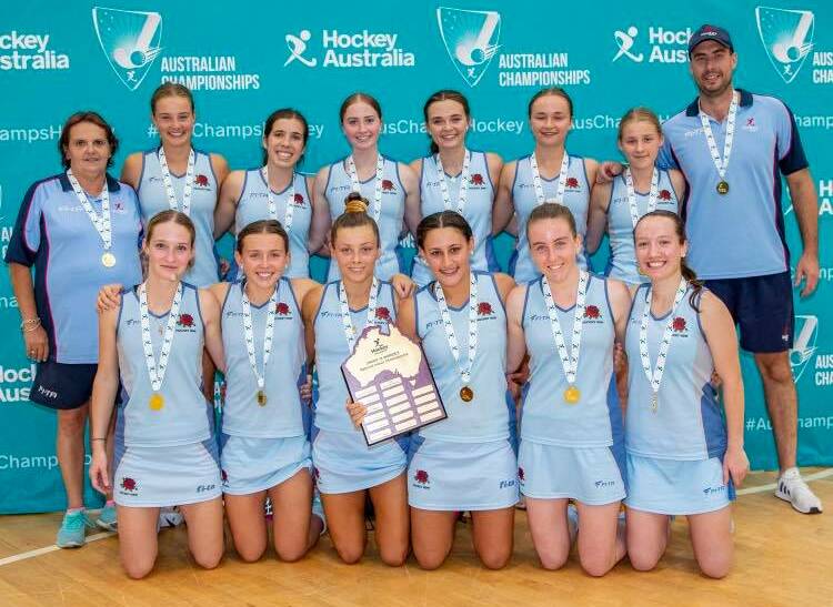 The NSW under-18 girls with their gold medals.