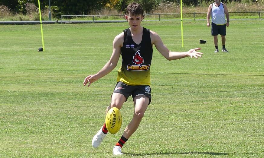 Practice makes perfect: Beau Guthrie performs a kicking drill during the Northern Heat's final training run. 