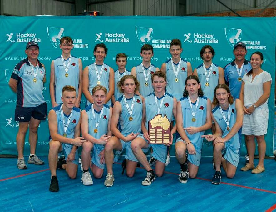 Champion effort: Tyler McCann (front third from left) with the victorious NSW under-15s boys side.