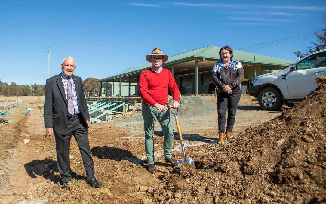 Armidale Regional Council interim administrator Viv May, Northern Tablelands MP Adam Marshall and Guyra Junior Rugby League president Gina Lockyer turn the ceremonial first sod of soil on the construction of the new grandstand.