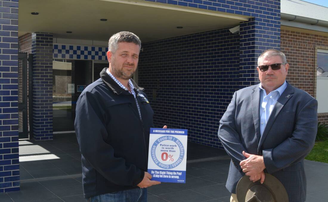 FIGHTING: Police Association of NSW's Chris Jordan and president Tony King outside Gunnedah Police Station. Photo: Jessica Worboys