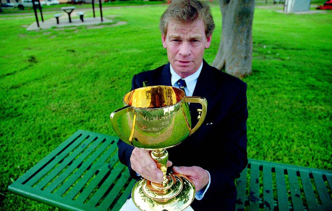 FAMILY TRADITION: Tim Moses is the fourth generation of the Moses family to own the 1920 Melbourne Cup after his great grandfathers horse Poitrel stormed home to win the race.Photo: Laurie Bullock
