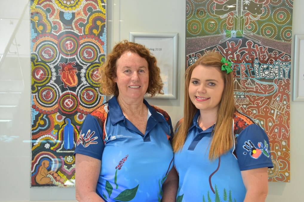 ART AND INCLUSIVENESS: Darlene Saladine and Cassandra Robertson wear the shirts inspired by local Indigenous artists Bevan Quinlin and Brian Irving's designs. Picture: Nicholas Fuller