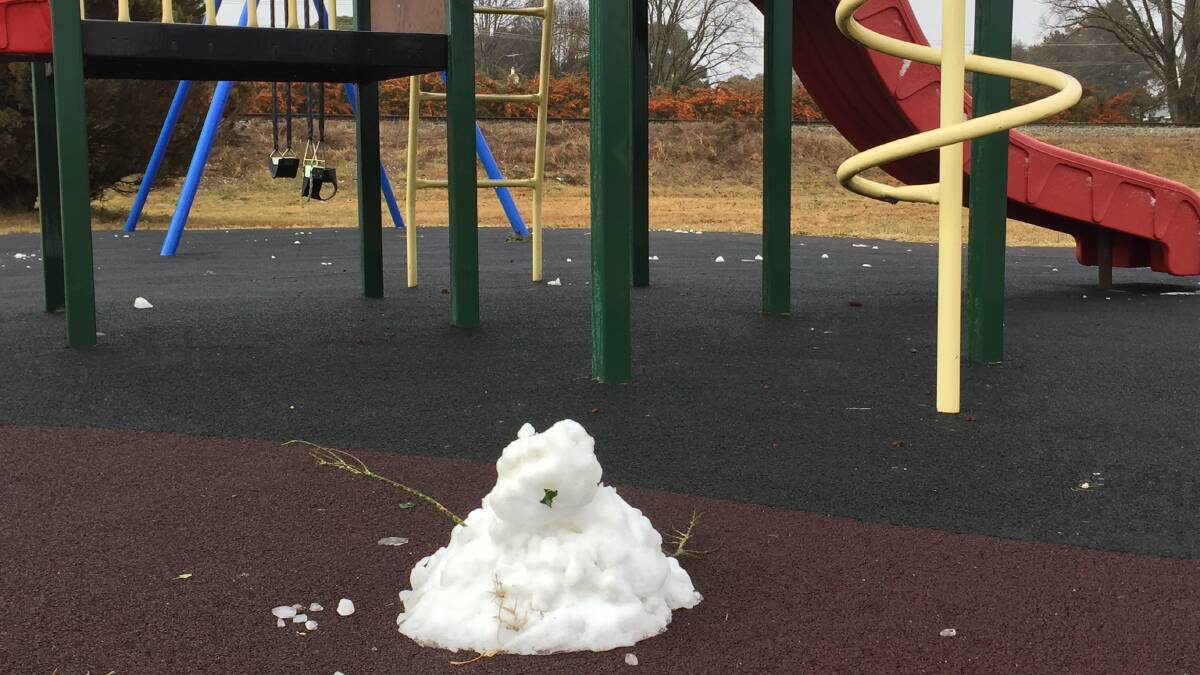 A small snowman was built with the remaining snow on Monday morning.