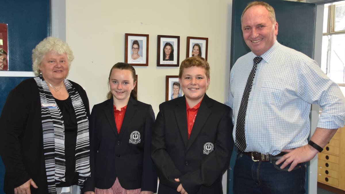 POLITICS AND PUPILS: Principal Julianne Crompton, school captains Marie Bowden and Riley Burton, and Member for New England the Hon. Barnaby Joyce. Photo: Nicholas Fuller