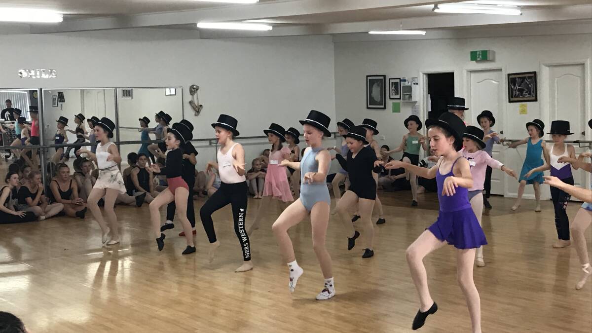 PUTTING ON THEIR TOP HATS: A BWA junior musical theatre workshop in Inverell in July. Picture supplied.
