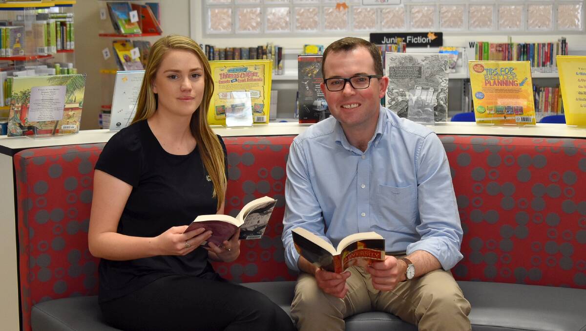 READING MATTERS: Moree Plains Shire Trainee Library Assistant Ebonie Hyland and Northern Tablelands MP Adam Marshall.