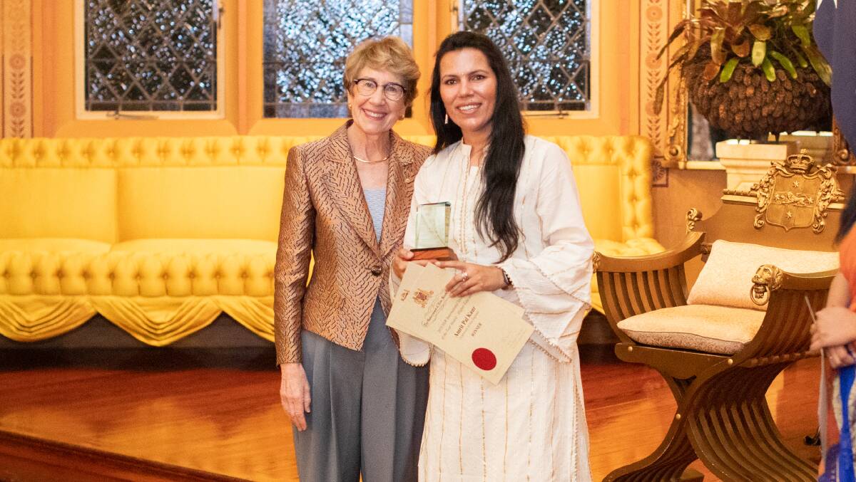 OUTSTANDING: UNE student Amrit Pal Kaur was named NSW's international student of the year. The state governor, the Hon. Margaret Beazley, presented the award. Photo: Anna Zhu.