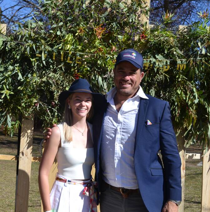 CHARITY: St Alberts Charity Committee president Laura Penrose and Little Windmills Ambassador and Former Wallaby James Holbeck. Photo: Supplied