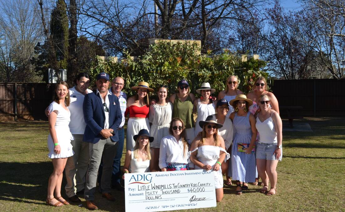 CHEQUE IT OUT!: The St Alberts Charity Committee present Little Windmills Ambassador James Holbeck a donation cheque valued at $40,000. Photo: Supplied.
 