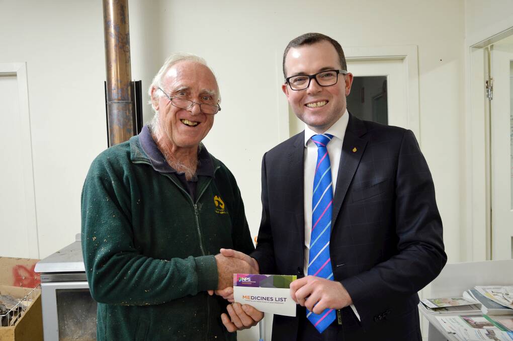 Northern Tablelands MP Adam Marshall, right, congratulates Armidale Men’s Shed President Roy Powell on securing the funding to purchase the shed’s first Automated External Defibrillator (AED).