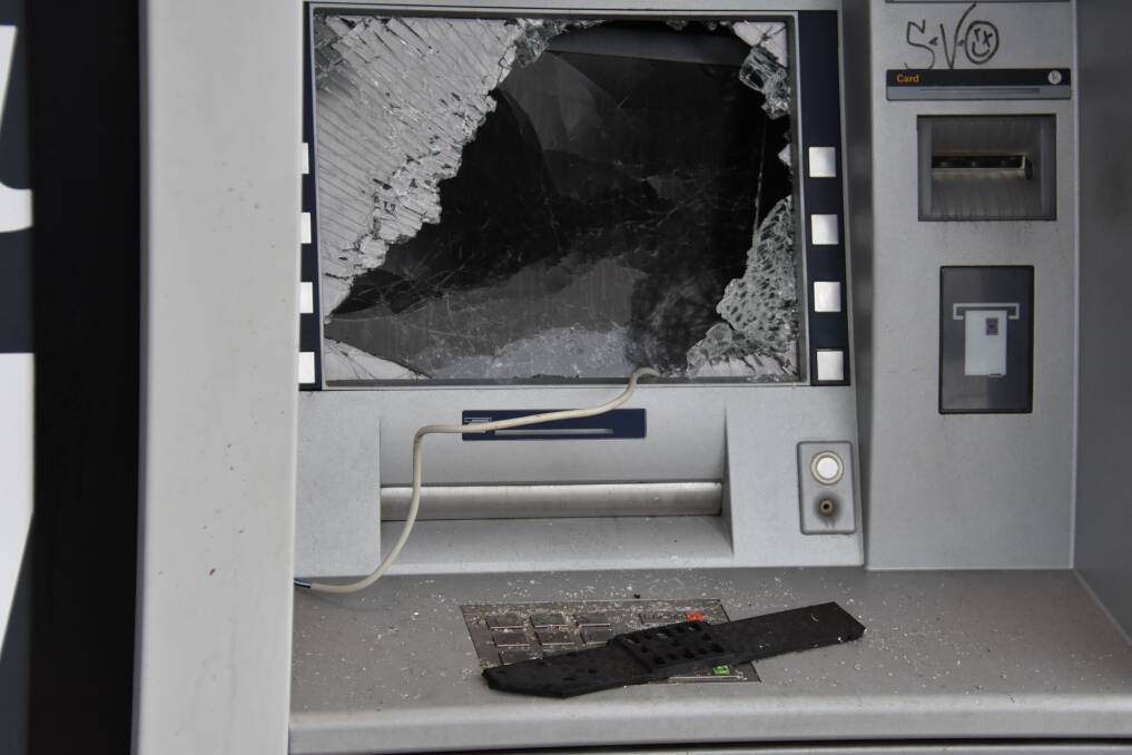HIT: The smashed screen of the Commonwealth Bank ATM outside Kirk's IGA.