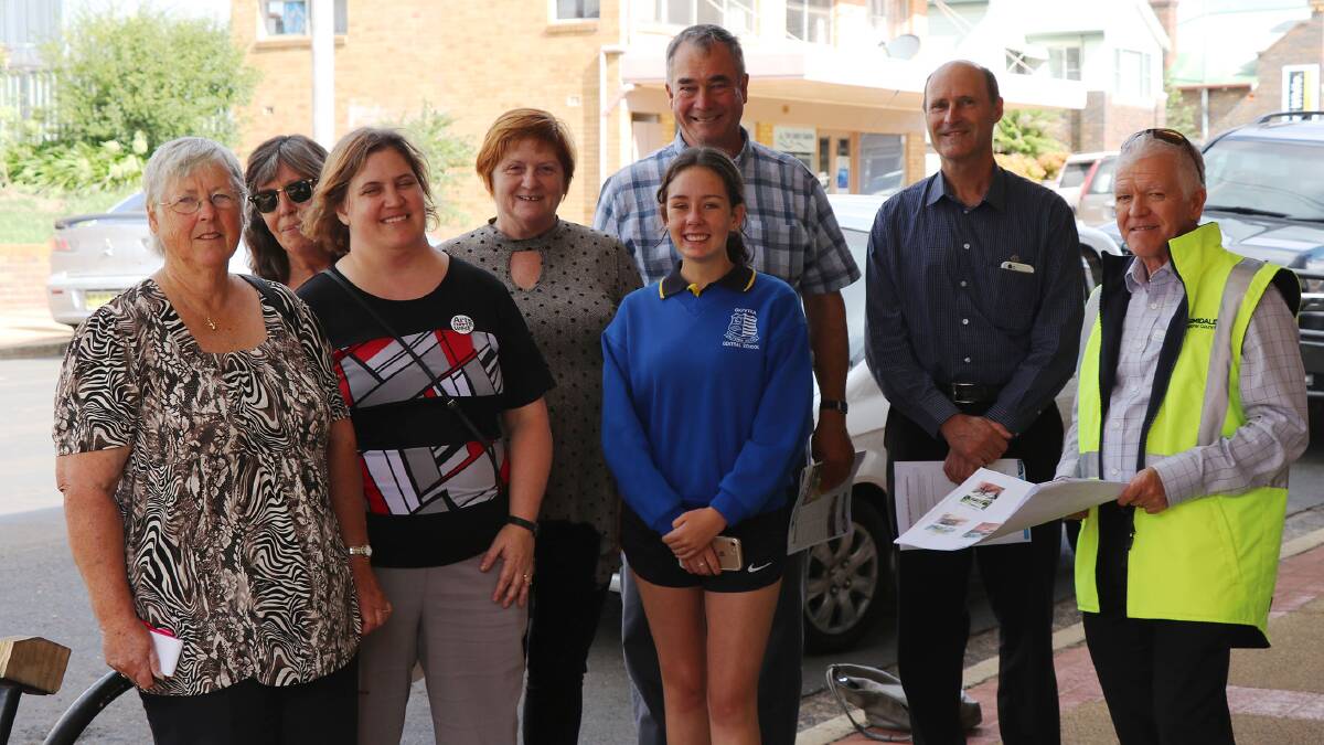 Members of the Arts, Cultural and Heritage Advisory Committee, Council staff and the mayor meet with students and staff from Guyra Central School to discuss the project. From left: Lynne Chapman, Kathy Martin, Caroline Downer, Michelle Nicholson, Bronte Stanley, Mayor Simon Murray, Ralf Stoeckeler and Rob Shaw.