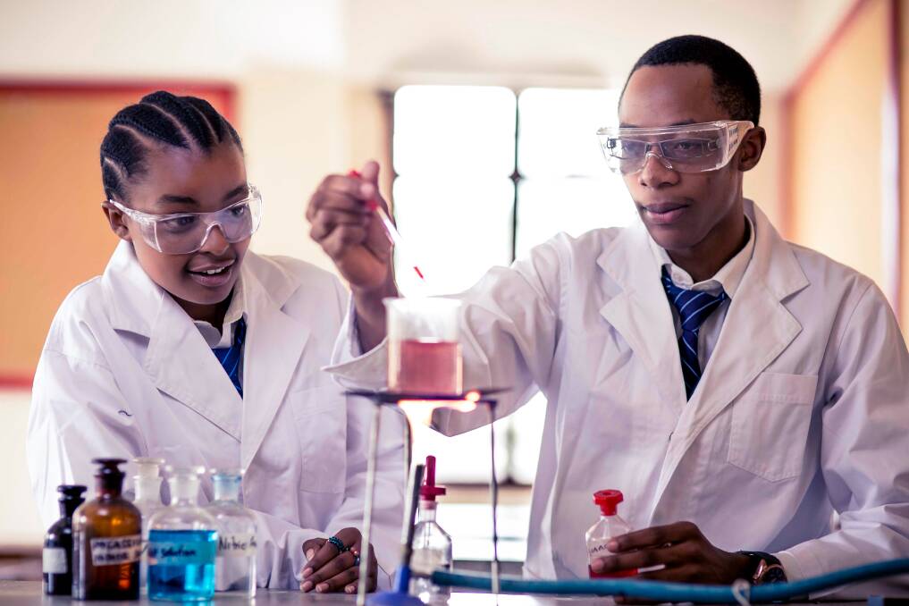 BRIGHT: Secondary students during science class. Photo: Marketing TSOSJ