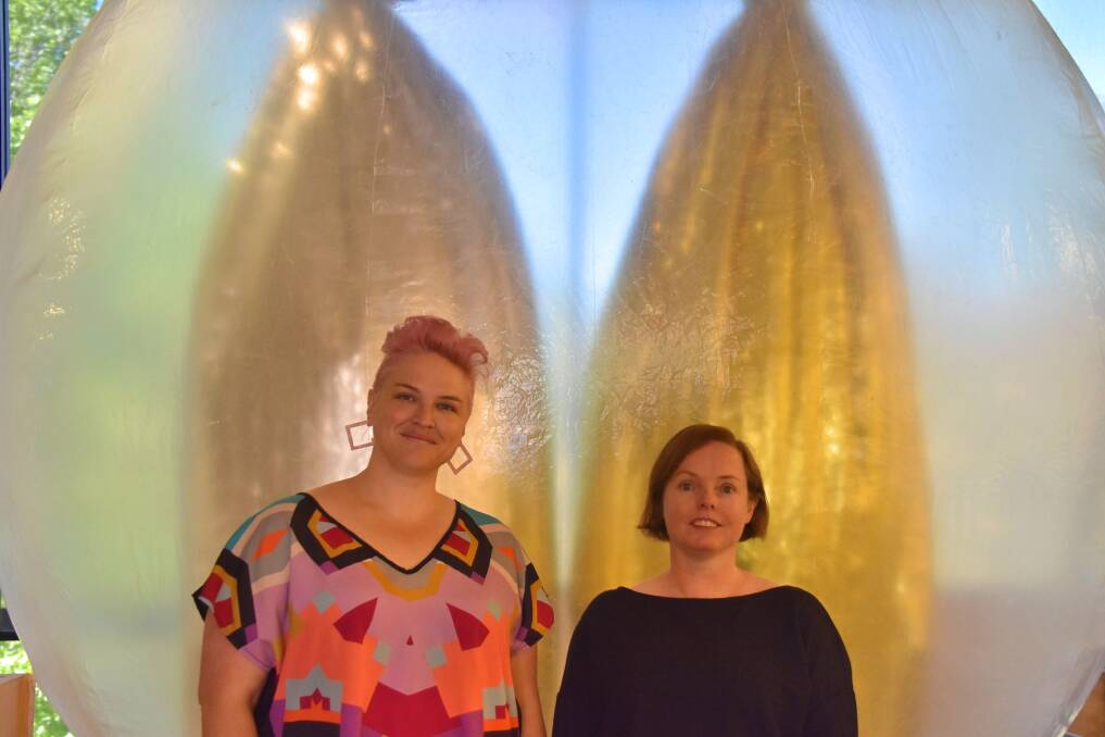 FUTURISTIC: NERAM director Rachael Parsons and curator Belinda Hungerford in front of an Experimenta artwork - like something out of Doctor Who. Photo: Nicholas Fuller
