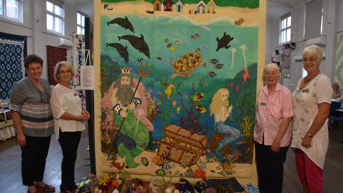 ART: Jennjifer Richards, Robyn Wood, Heather Roobol, and Conny Kinghorn with the Neptune's Garden entrance quilt. Photo: Nicholas Fuller
