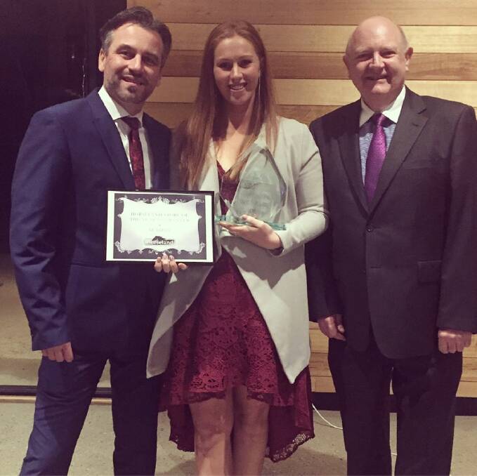 CHAMPION: Horseland Armidale manager Bec Cameron with regional area manager Matt Kearney and retail purchaser Greg Fegan.