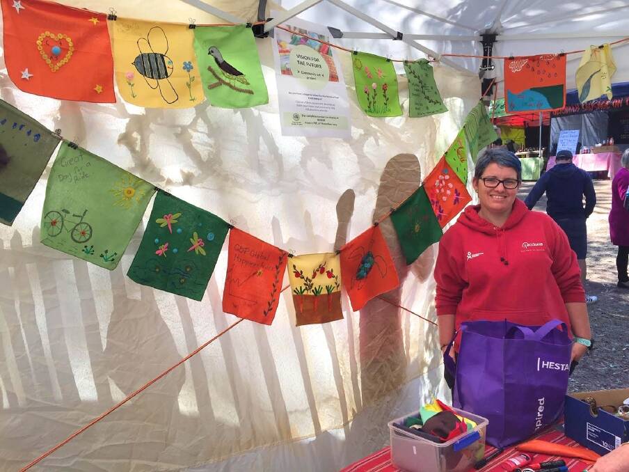 VISIONS FOR A GREENER FUTURE: Dr Mary McMillan collected decorated fabric squares at the Black Gully Festival last weekend. A wall hanging will be revealed on Thursday. Picture supplied.