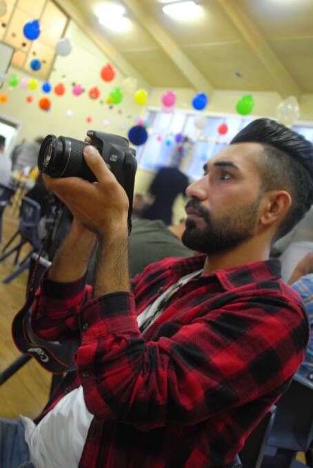EZIDI ARTIST: Waleed Alali taking photographs. Picture supplied.