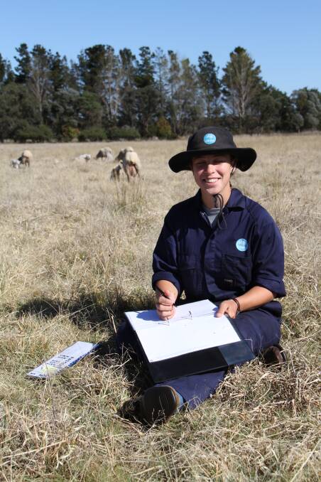 WOMEN IN SCIENCE: A CSIRO student recording data in the paddock at lambing time. Photo supplied by Dr Sonja Dominik.