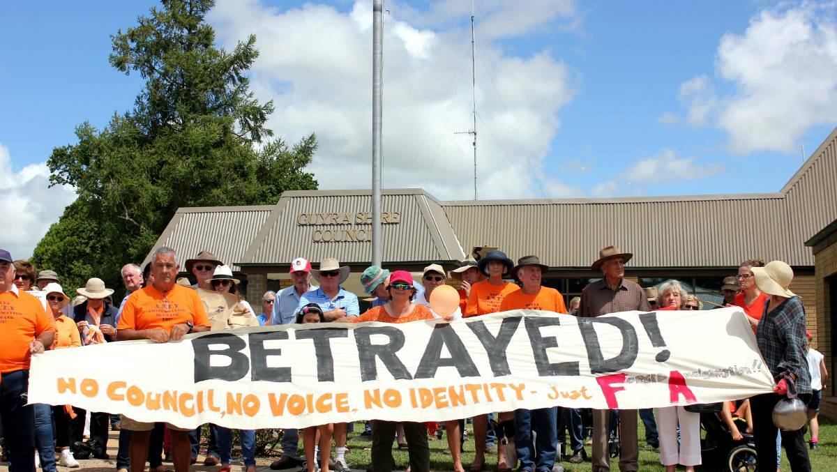 Guyra residents protesting against the merger. Photo: Rachel Baxter