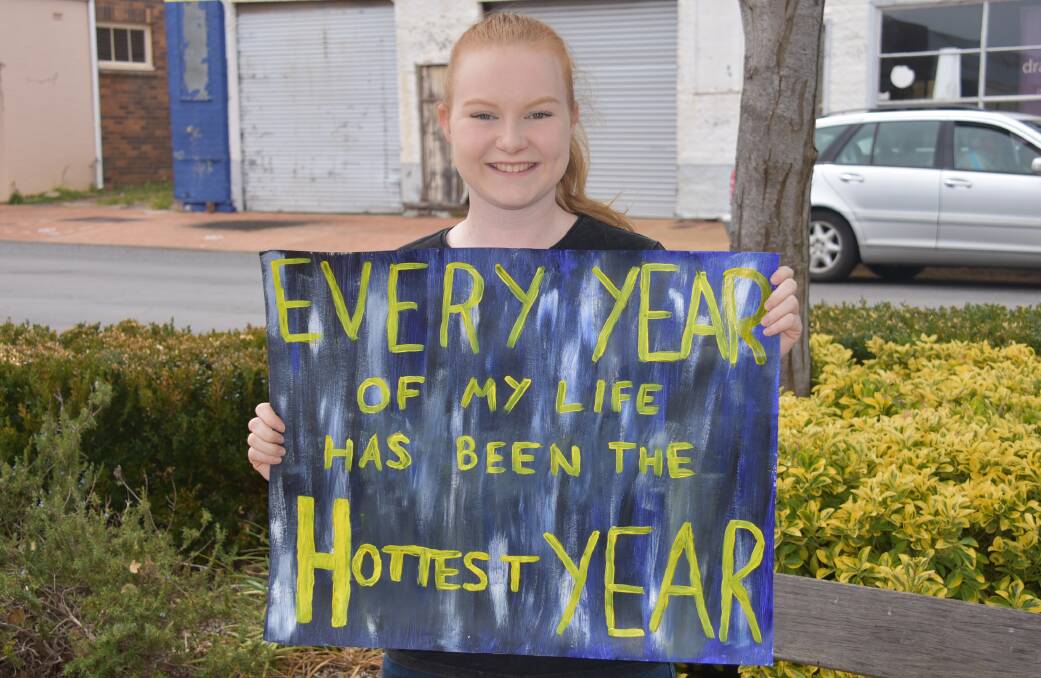 PROTESTER: Shayla Oates, Year 12 student at The Armidale School, has organised a school strike in Central Park today. Photo: Nicholas Fuller