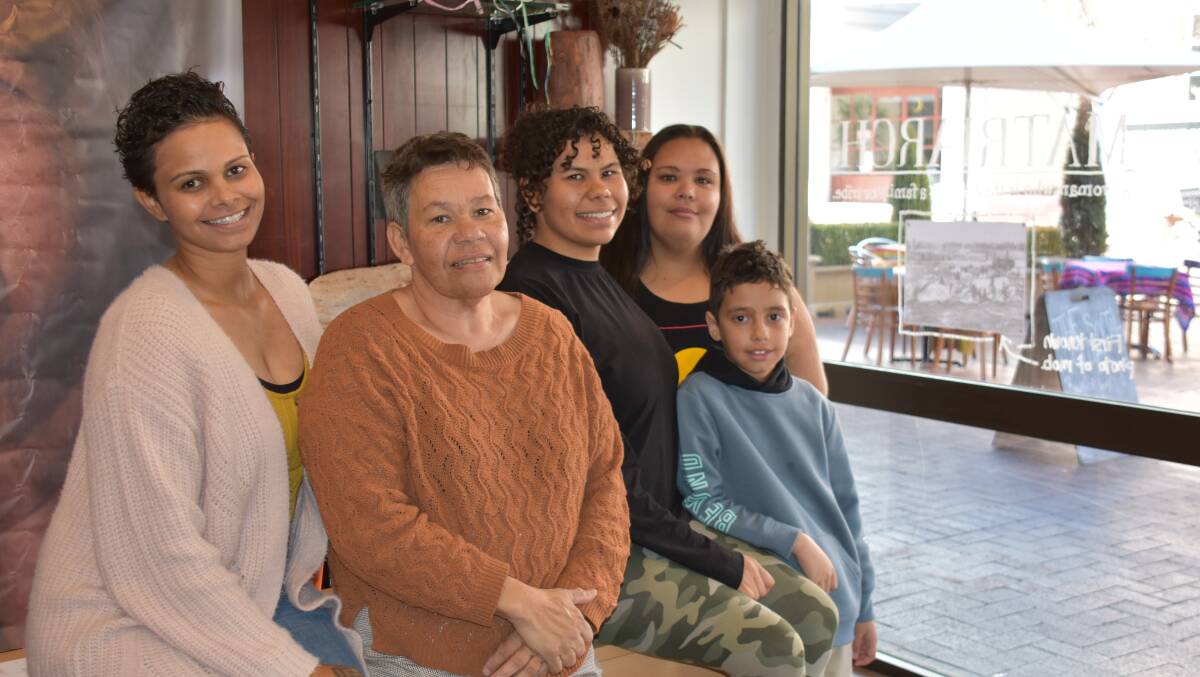 FAMILY: Gabi Briggs (centre) with team members Merindah and Susan Briggs (left), and Regina Gordon and Mirakai Keidge (right). Photo: Nicholas Fuller