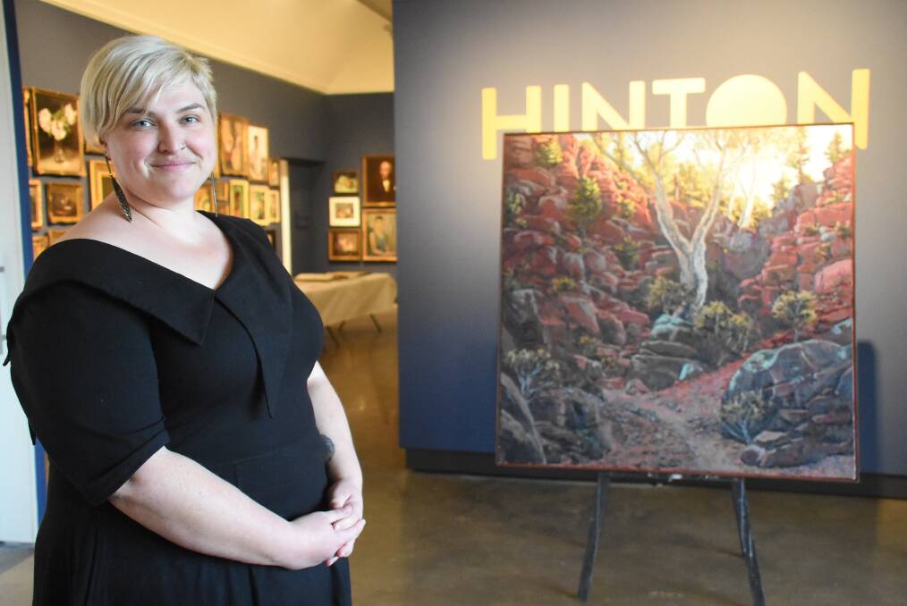 CURATOR: NERAM director Rachael Parsons with one of the acquisitions, a Lucy Culliton painting. Photo: Nicholas Fuller.