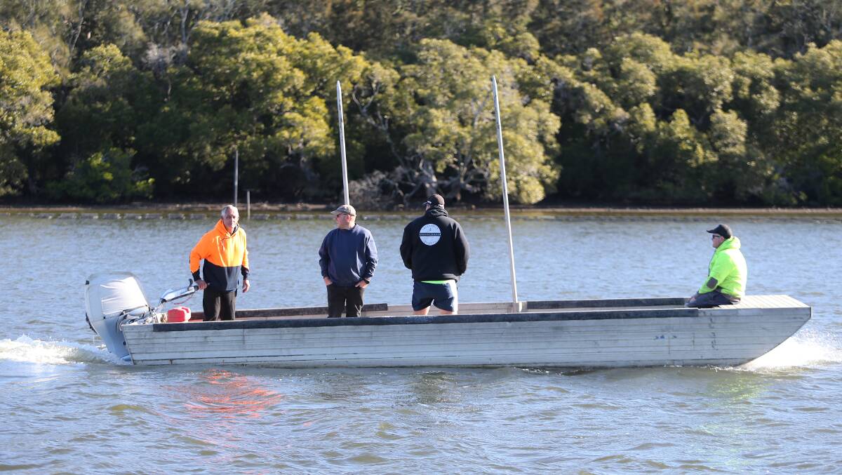 Oyster farmers heading back to their farms after talks with agricultural minister Dugald Saunders at Taylors Beach on June 16. Picture: Peter Lorimer 
