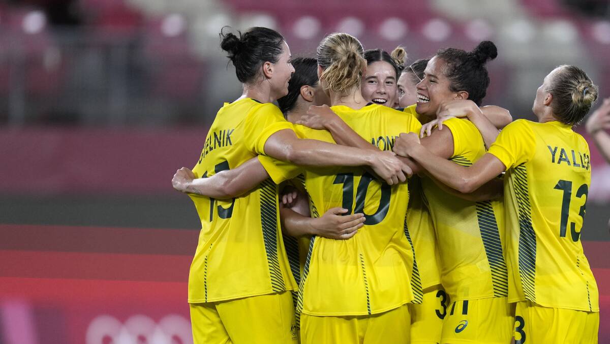 Australia's Mary Fowler, center, celebrates scoring her side's third goal against Britain with teammates. Picture: AP Photo/Fernando Vergara