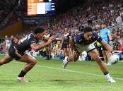 Murray Taulagi scored two tries as North Queensland defeated the Wests Tigers 36-12 in the NRL.