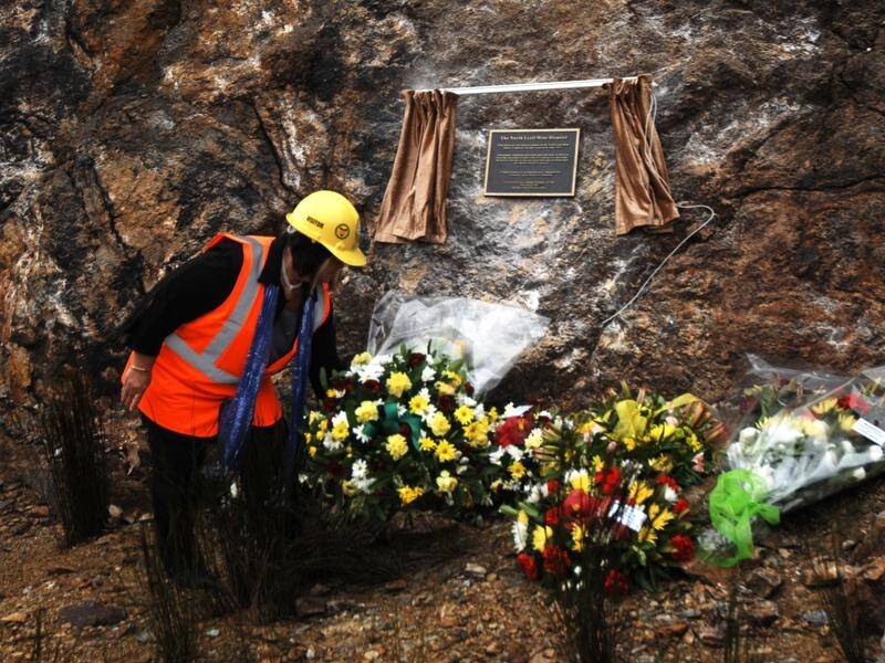 A coroner says mining at Mt Lyell had come at a human cost, including 42 deaths in 1912.