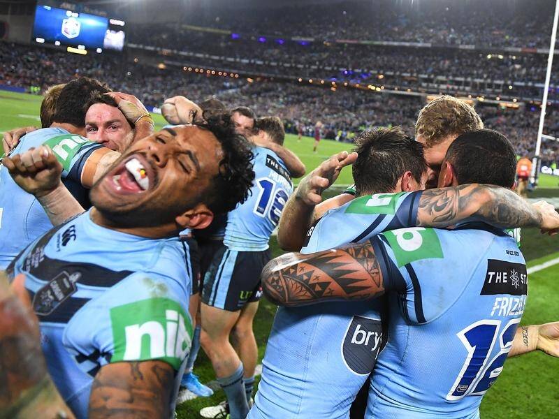NSW celebrate after a last-gasp game three State of Origin series-deciding win over Queensland.