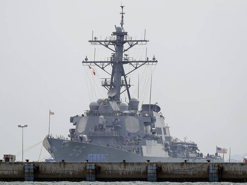 Russia says one of its warships has chased off the USS John S McCain from the country's waters.