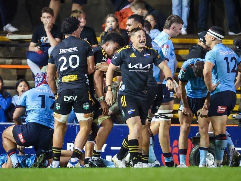 The Hurricanes have hurt the Waratahs' top-four hopes with a come-from-behind win in Sydney.